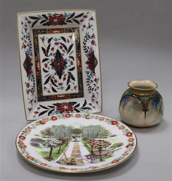 A Hadleys Worcester small vase, painted with iris, a Royal Worcester Prince Regent dish and a garden design plate